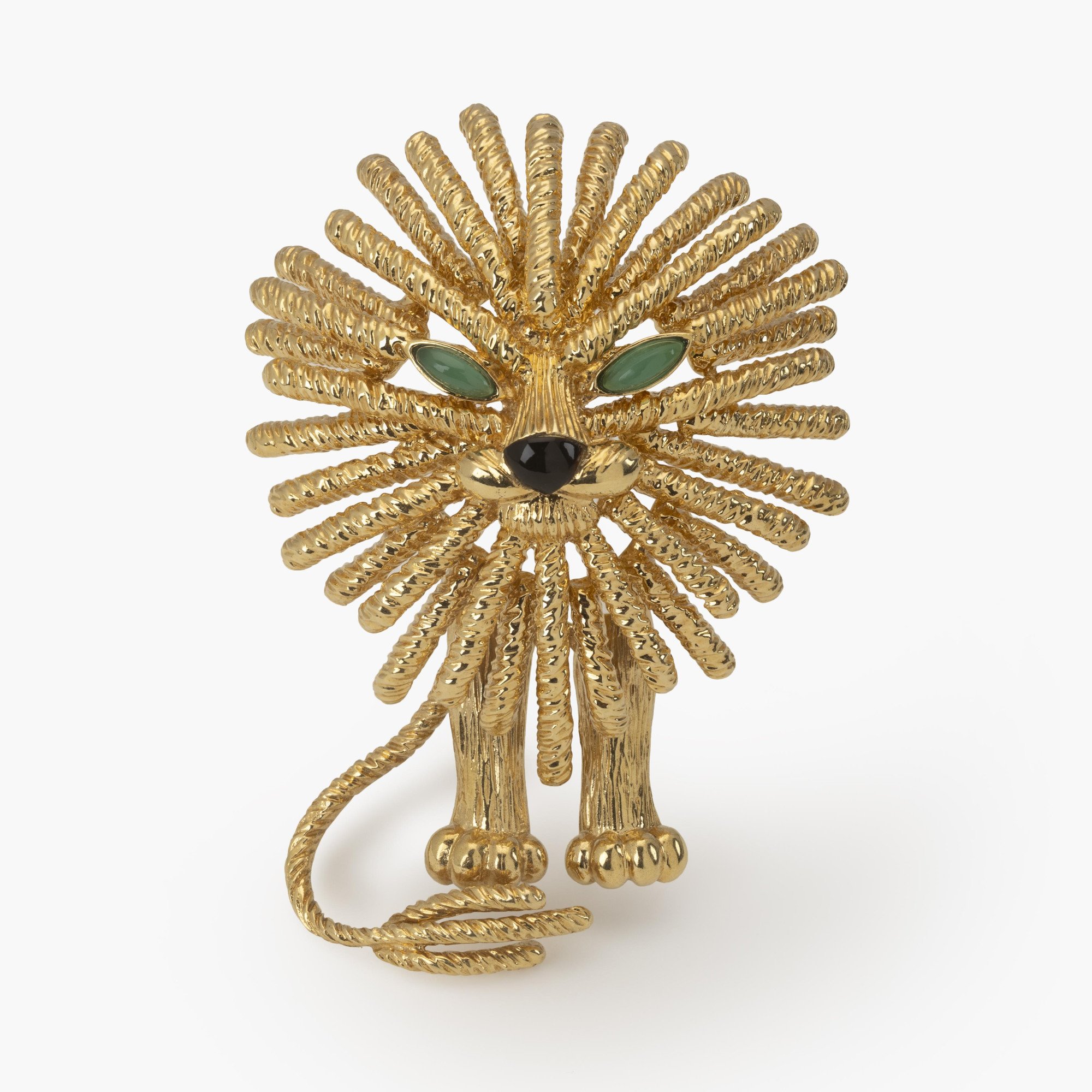 An eighteen-carat yellow gold brooch depicting a lion. Signed Van Cleef & Arpels, made in Paris, dated 1972 and numbered. In original case.
