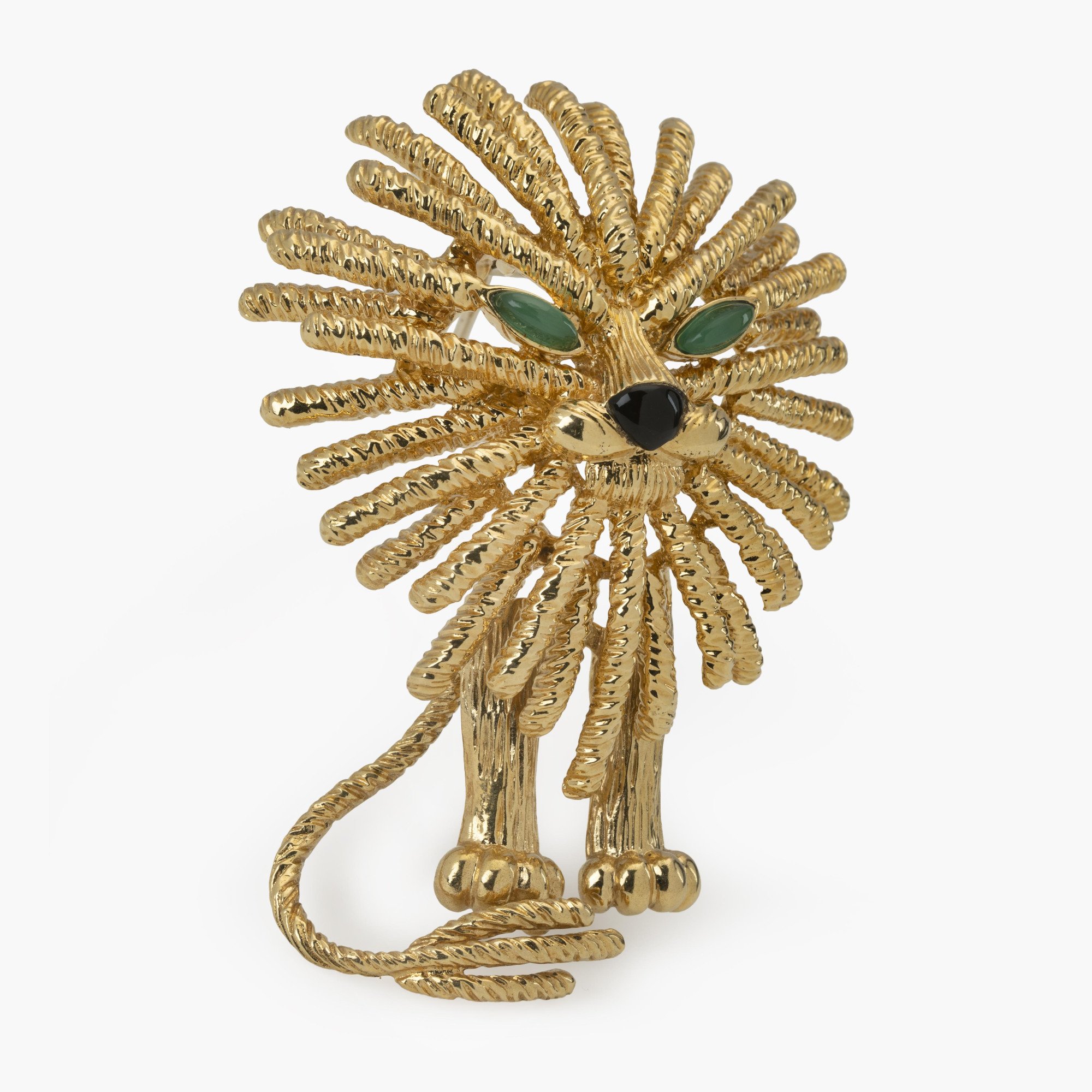 An eighteen-carat yellow gold brooch depicting a lion. Signed Van Cleef & Arpels, made in Paris, dated 1972 and numbered. In original case.