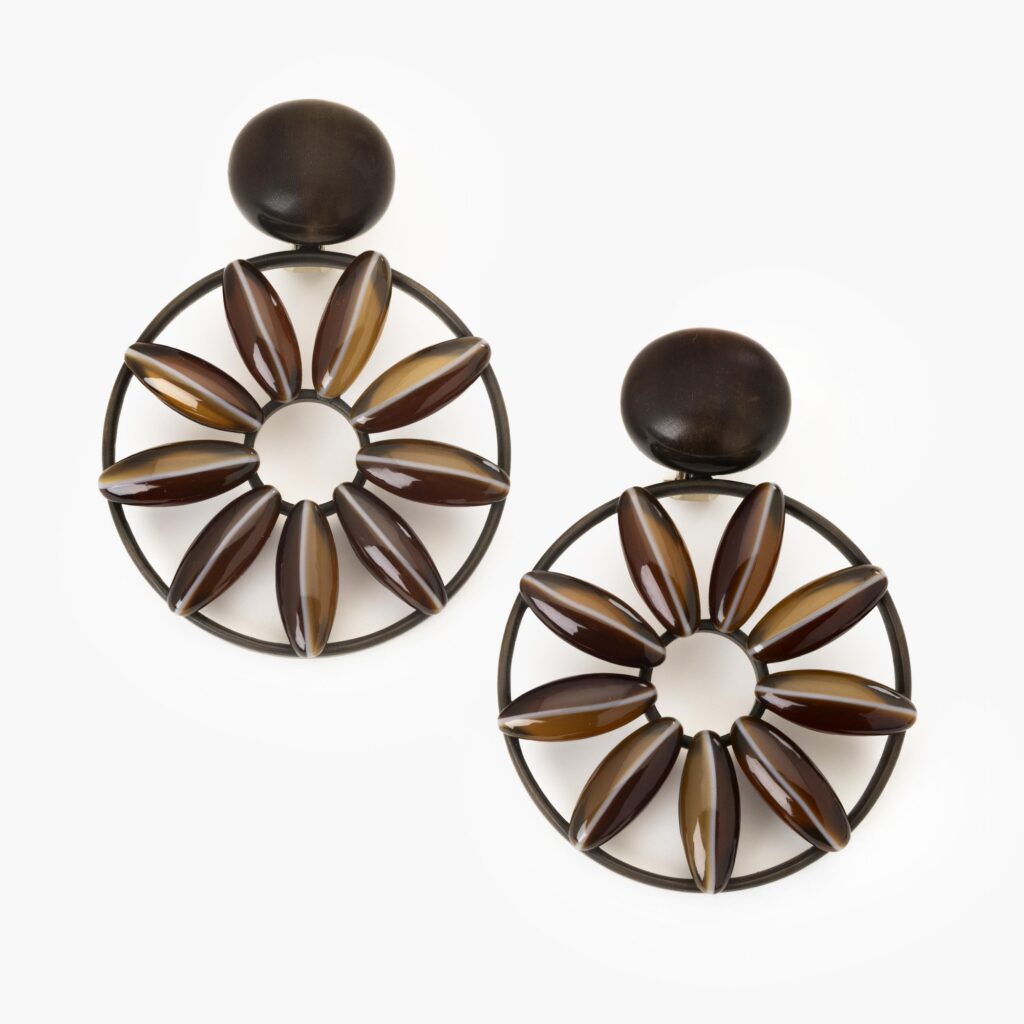 A pair of eightteen karat white gold and bronze earrings, set with wood and striped agates. Signed Hemmerle, Munich, 21st century. With original pouch.