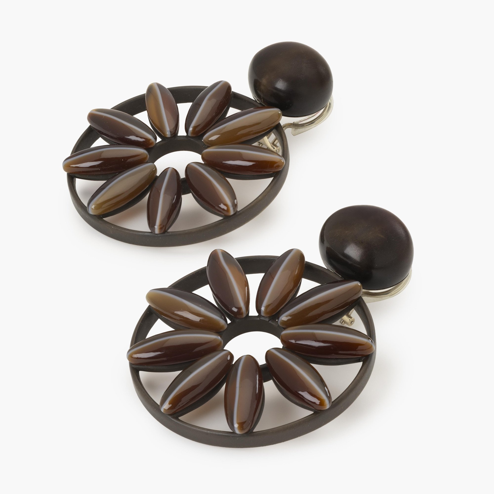 A pair of eightteen karat white gold and bronze earrings, set with wood and striped agates. Signed Hemmerle, Munich, 21st century. With original pouch.