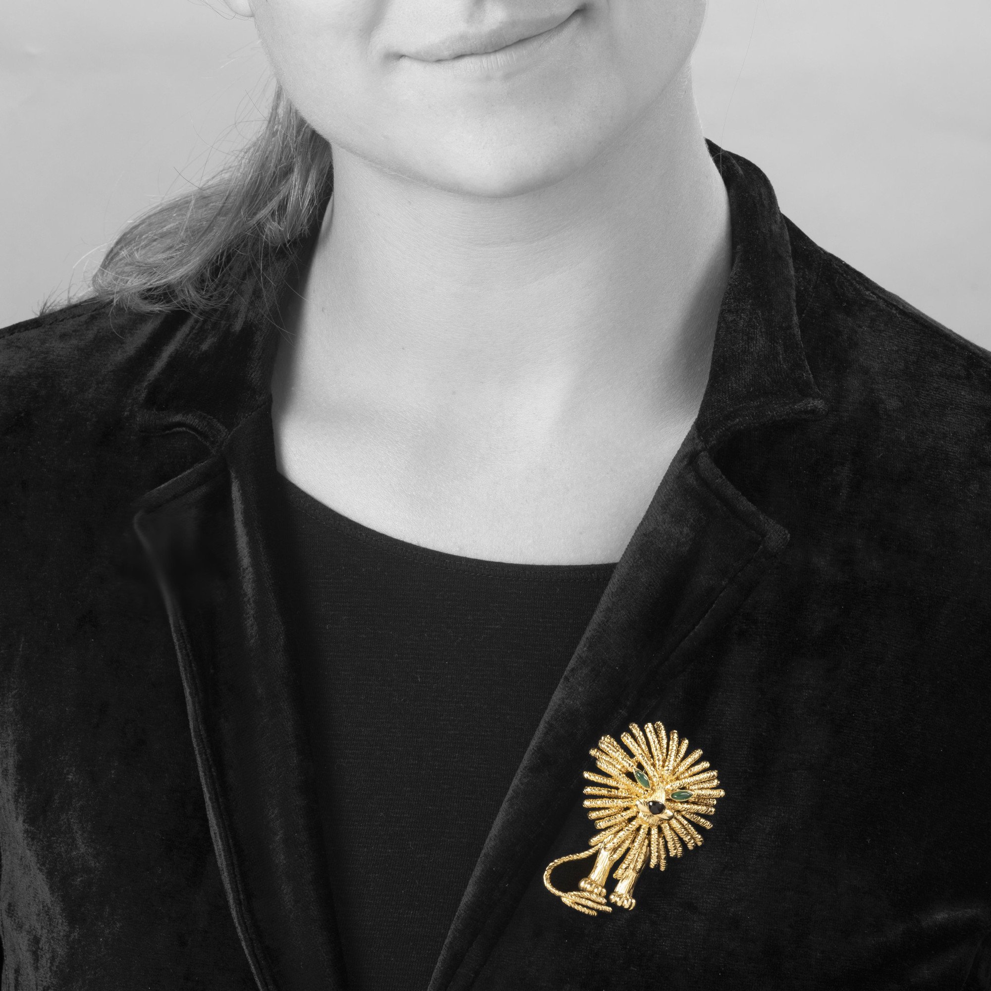 An eighteen-carat yellow gold brooch depicting a lion. Signed Van Cleef & Arpels, made in Paris, dated 1972 and numbered. In original case.