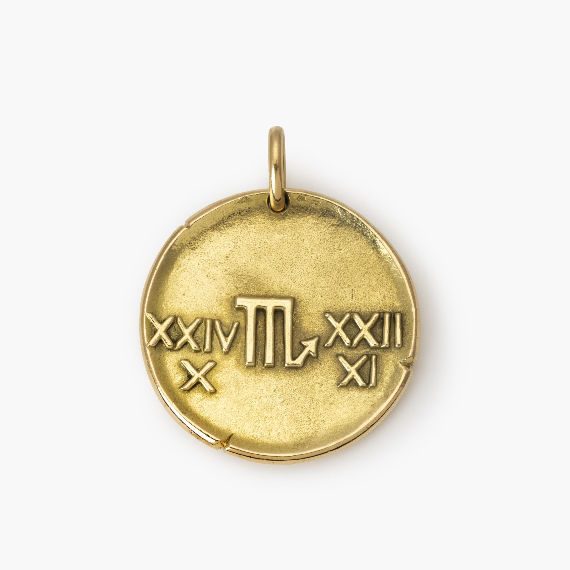 An eighteen carat yellow gold pendant with the zodiac sign scorpio. Signed Van Cleef & Arpels, Paris, ca 1970. With maker’s mark of Georges Lenfant, Paris.
