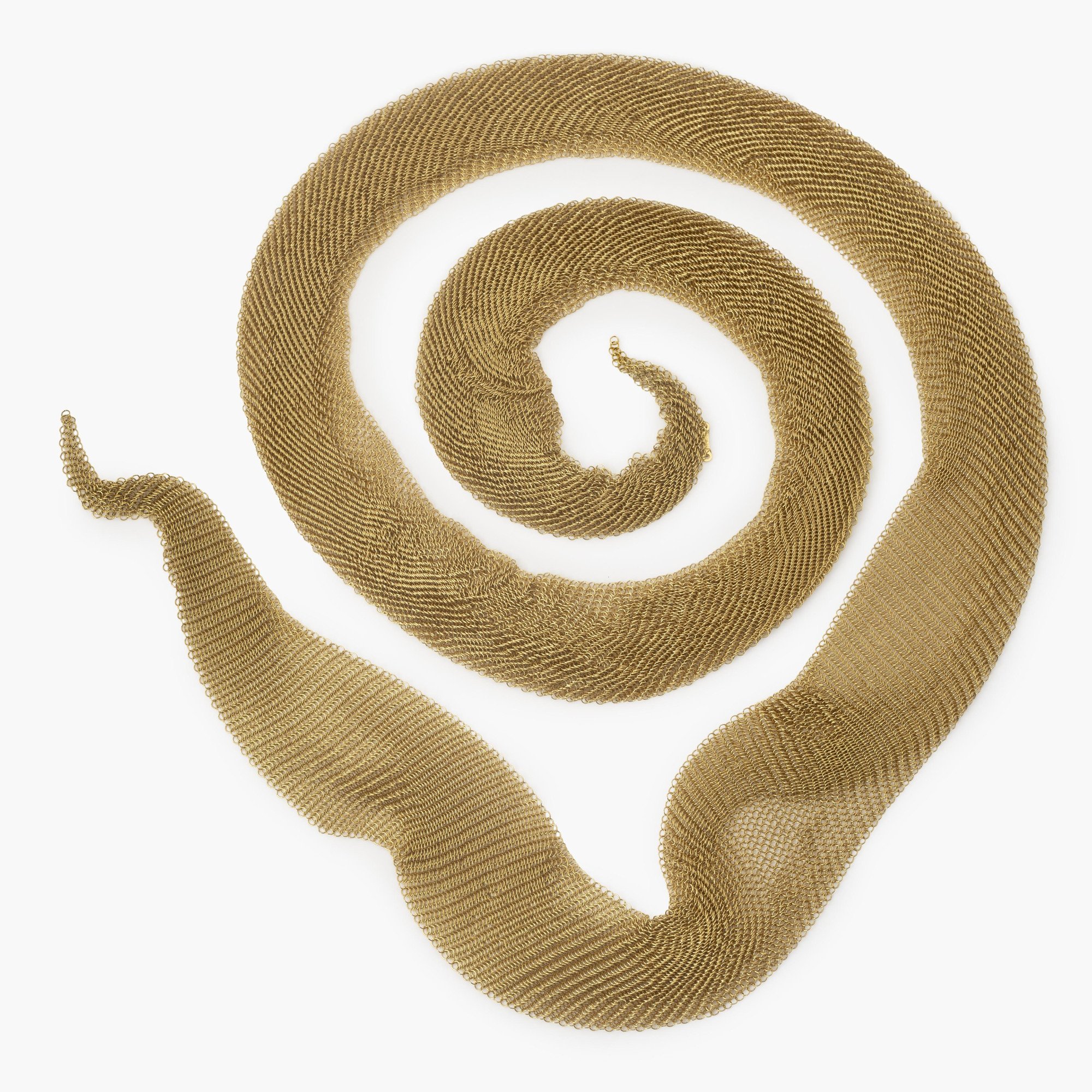 An eighteen carat yellow gold necklace designed as a scarf, signed Elsa Peretti for Tiffany & Co., made in the USA, ca 1980. With original pouch.