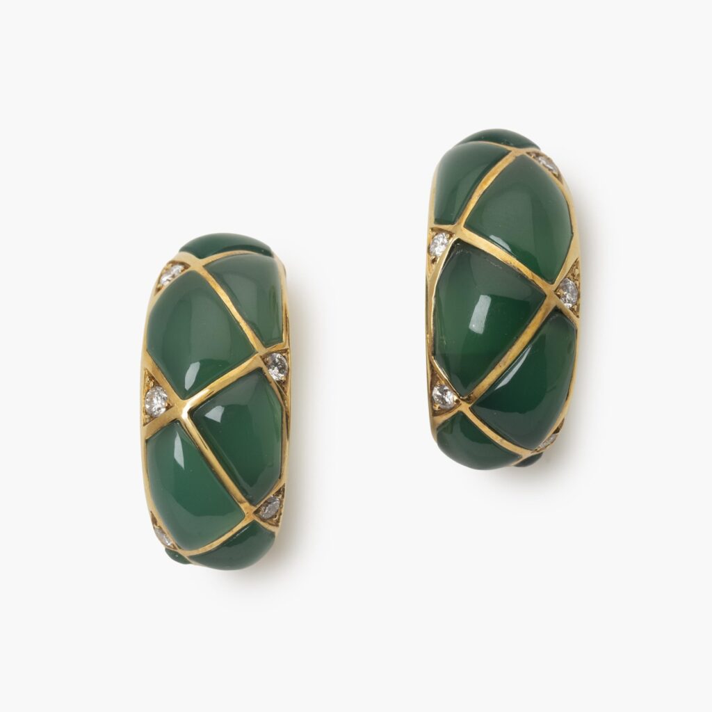 A pair of eighteen carat yellow gold clip earrings, set with green agates and diamonds. Signed Van Cleef & Arpels, dated 1967. Made by Pery et Fils, Paris.
