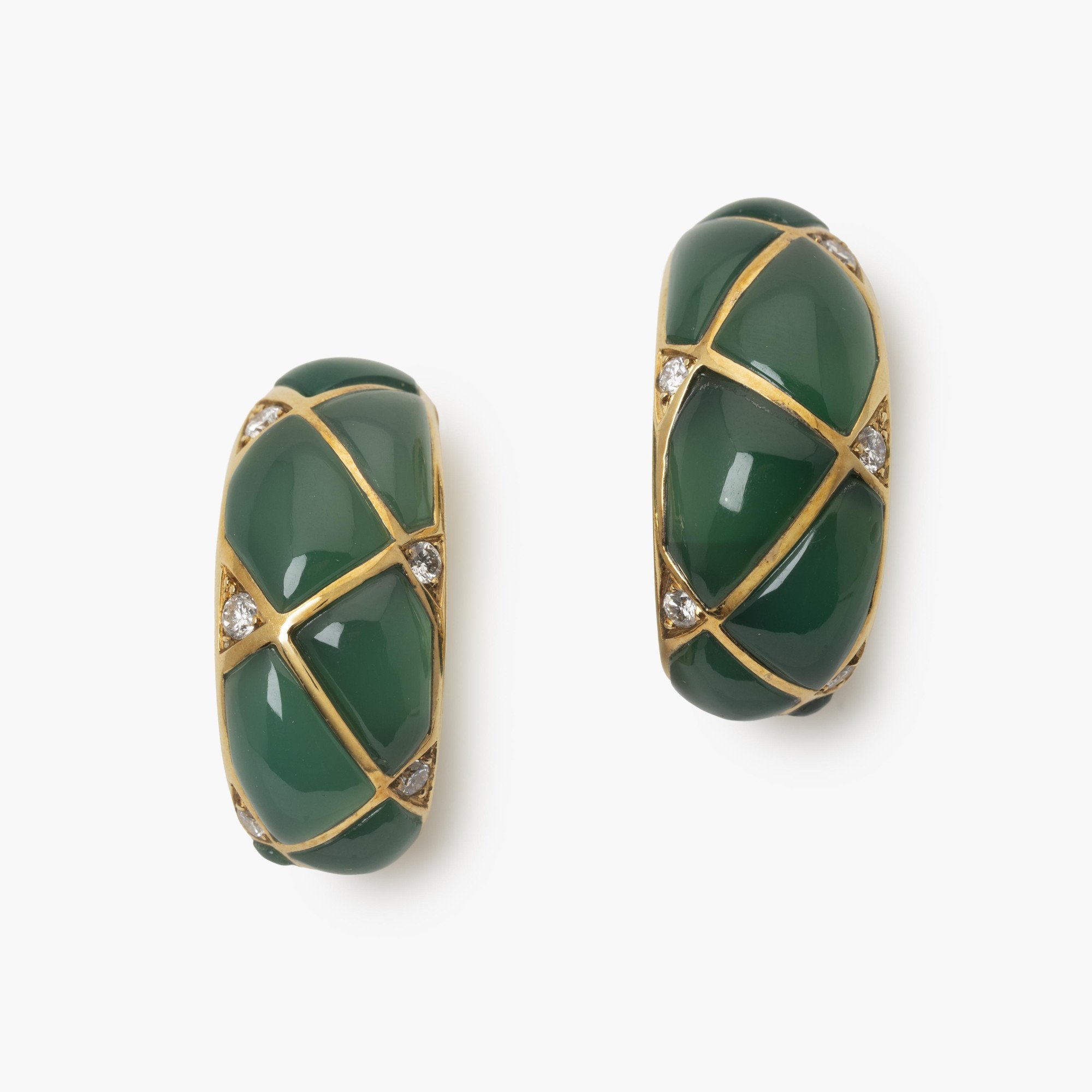 A pair of eighteen carat yellow gold clip earrings, set with green agates and diamonds. Signed Van Cleef & Arpels, dated 1967. Made by Pery et Fils, Paris.