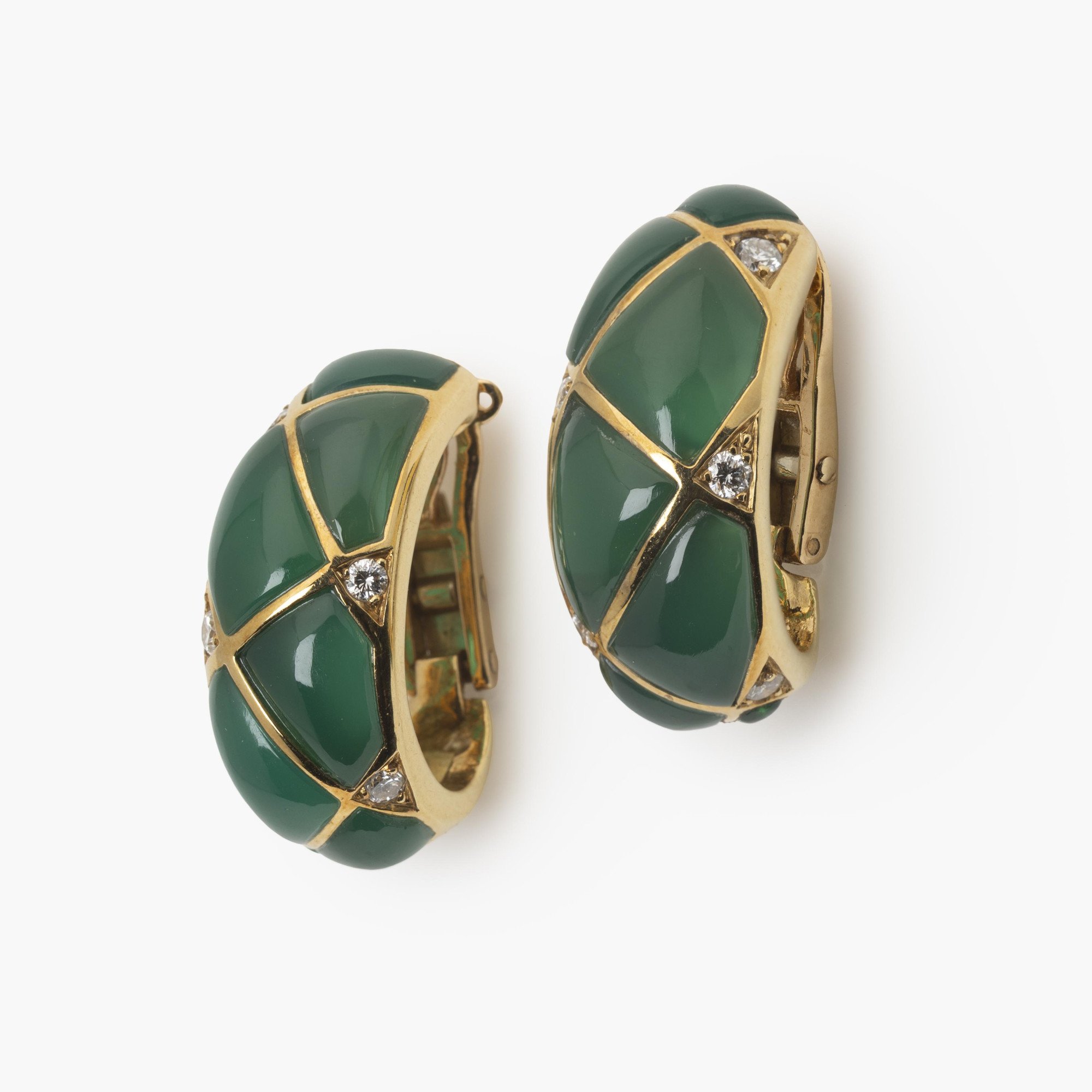A pair of eighteen carat yellow gold clip earrings, set with green agates and diamonds. Signed Van Cleef & Arpels, dated 1967. Made by Pery et Fils, Paris.