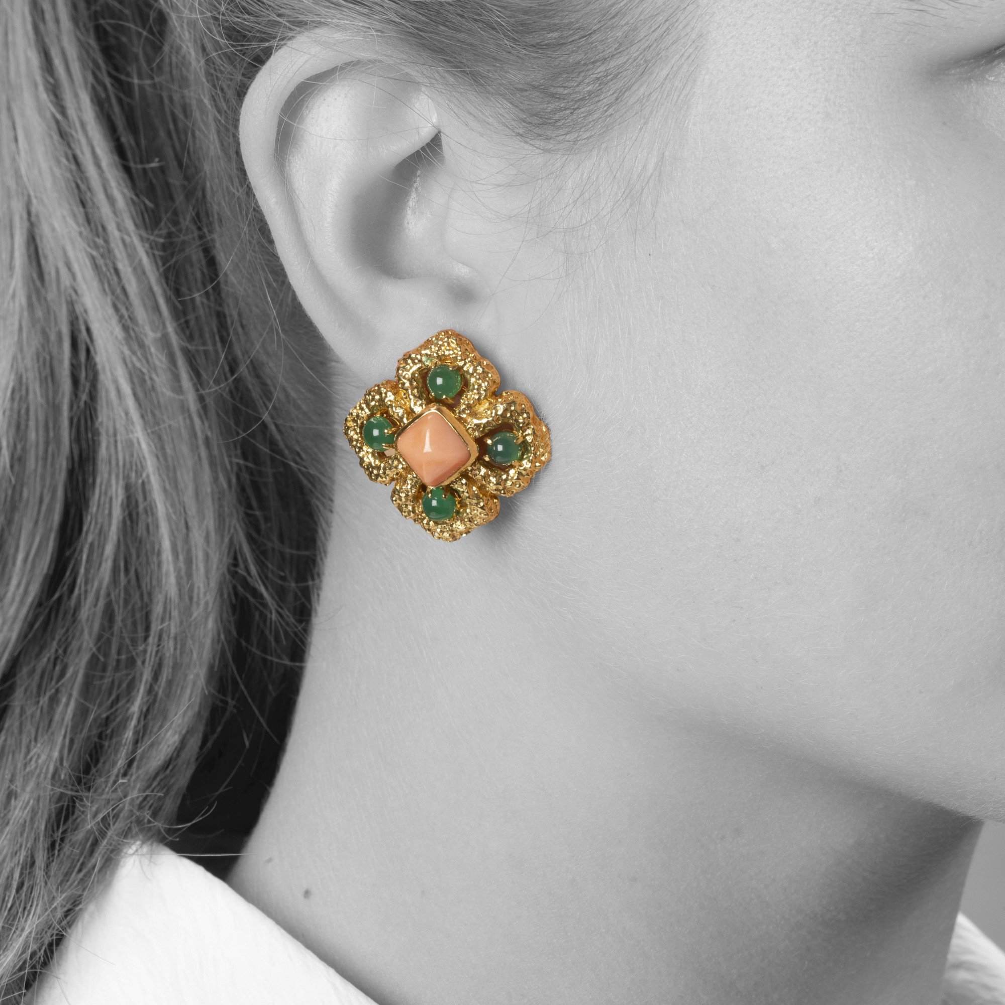 A pair of eighteen carat yellow gold clip earrings, model ‘Delphes’, set with coral and green agate. Signed Van Cleef & Arpels, made in Paris, ca 1970.